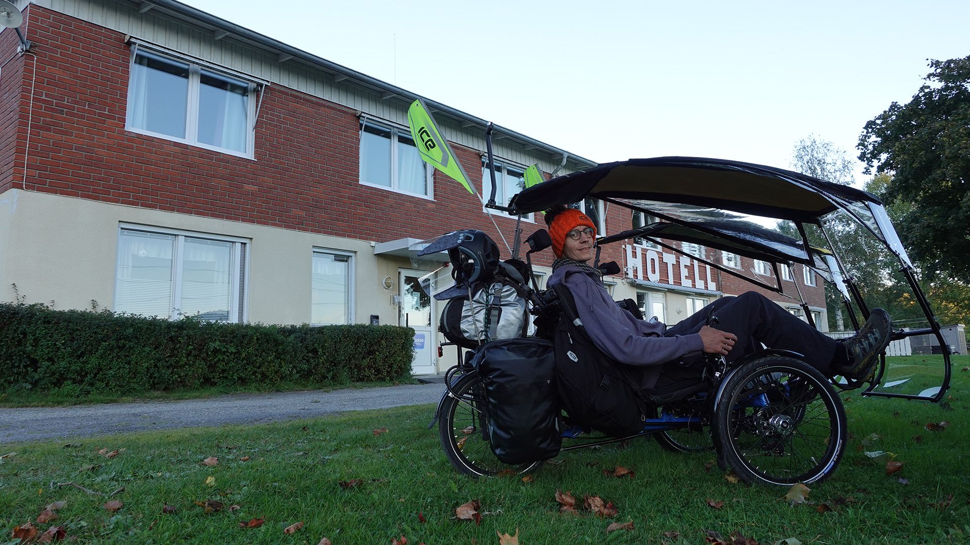 trike-rider-outside-house